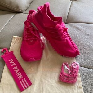 Limited edition Ivy Park hot pink Adidas Ultra boost.